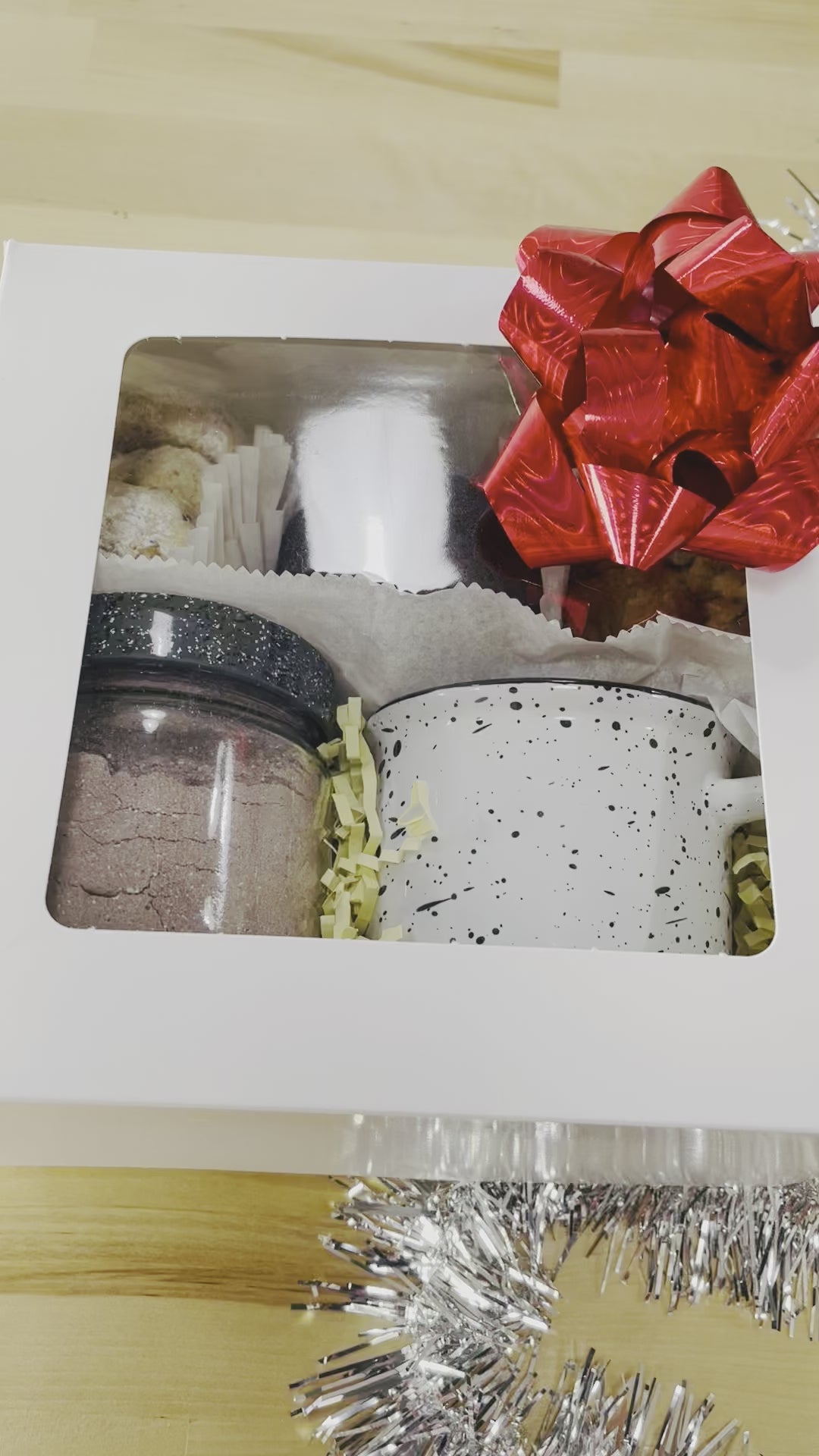 Hot chocolate kit! It comes with a Coffee mug, hot chocolate powder mix,  4 butter pecan cookies, 2 guava oatmeal cookies and 2 double chocolate cookies.